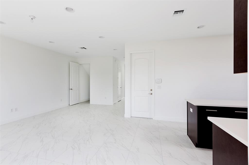 6947 Pines Circle, Unit 21 Pompano Beach, FL 33073 - Photo 7 of 31 a view of an empty room