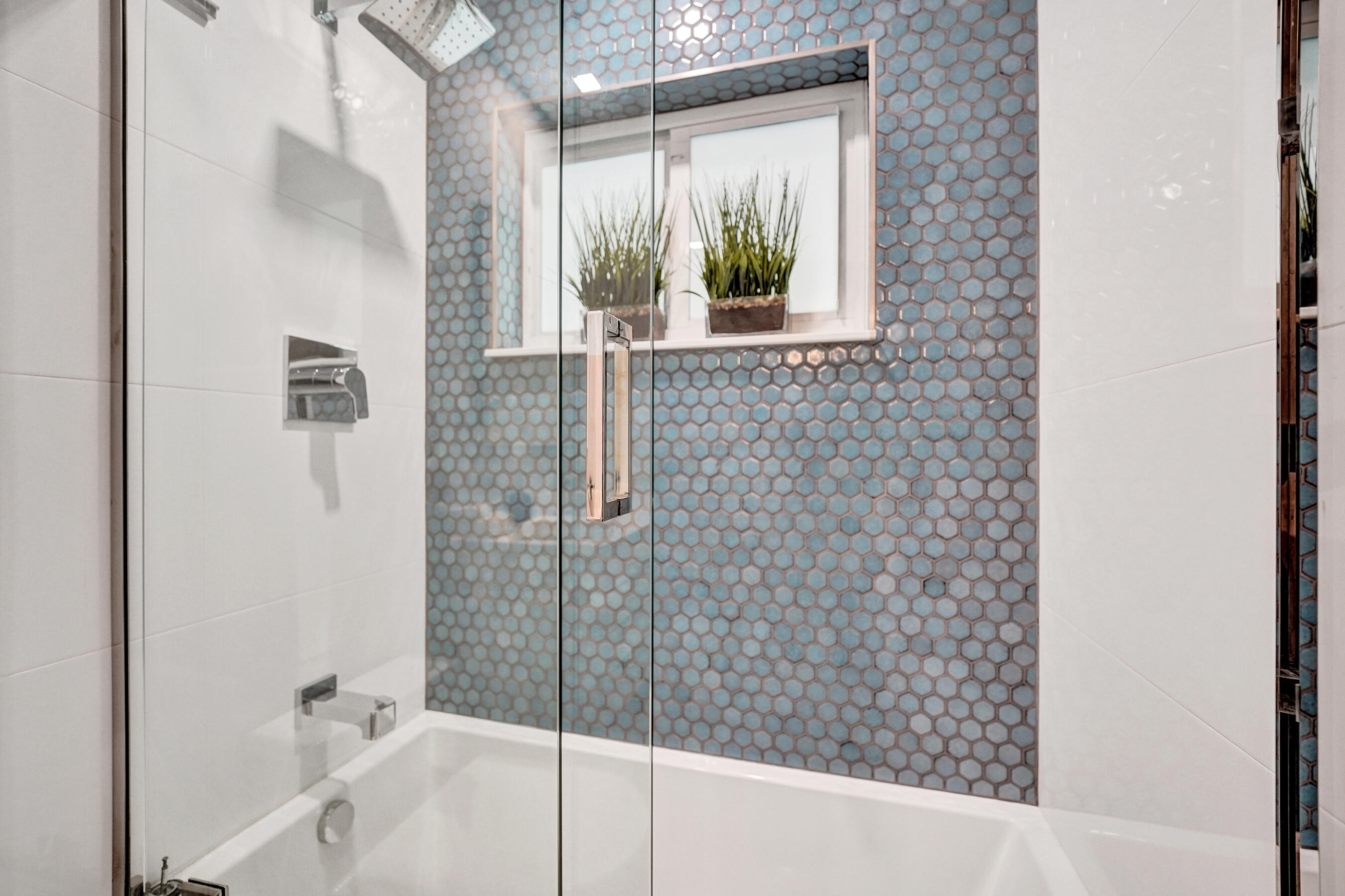 381 Southeast 3rd Street Pompano Beach, FL 33060 - Photo 32 of 41 a bathroom with a bathtub and shower