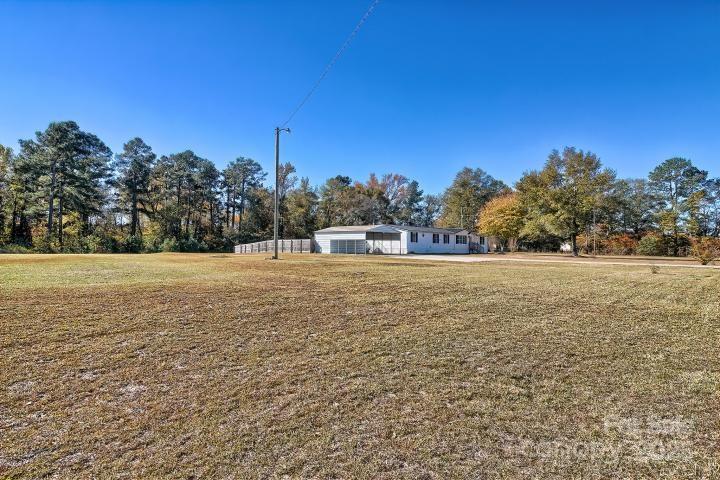 9552 Flat Creek Road Kershaw, SC 29067 - Photo 3 of 47 a view of patio and yard