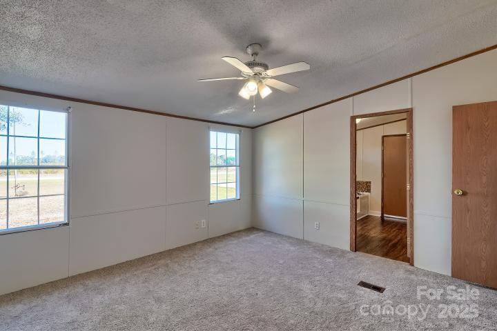 9552 Flat Creek Road Kershaw, SC 29067 - Photo 35 of 47 a view of an empty room with a window