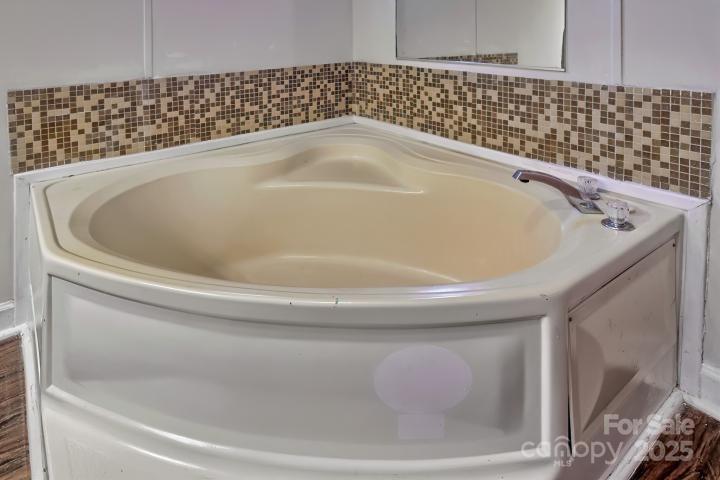 9552 Flat Creek Road Kershaw, SC 29067 - Photo 38 of 47 a close view of a bathtub in a bathroom