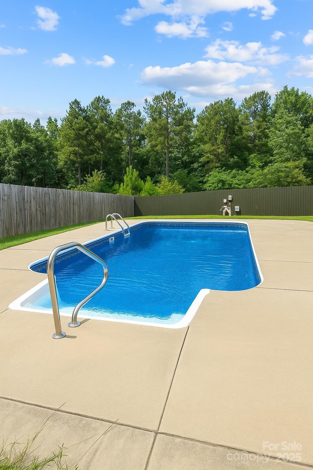 9552 Flat Creek Road Kershaw, SC 29067 - Photo 4 of 47 a view of a swimming pool with a yard
