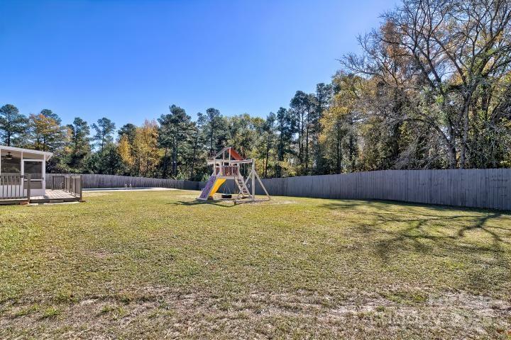 9552 Flat Creek Road Kershaw, SC 29067 - Photo 46 of 47 a view of a playground with a slide