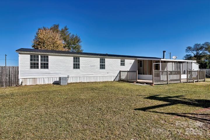 9552 Flat Creek Road Kershaw, SC 29067 - Photo 5 of 47 front view of a house with a yard