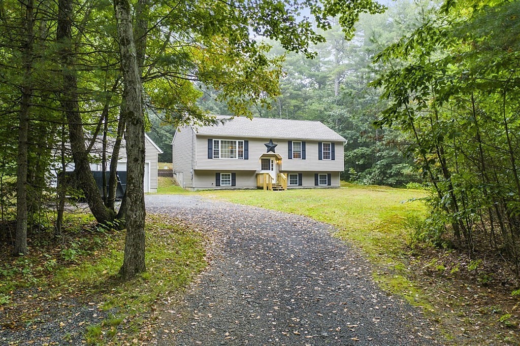 a house view with a garden space