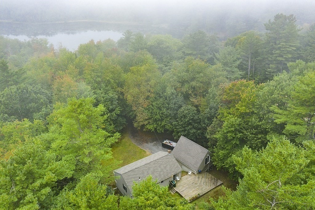 235 Minott Road Westminster, MA 01473 - Photo 29 of 32 an aerial view of a house with yard and outdoor seating
