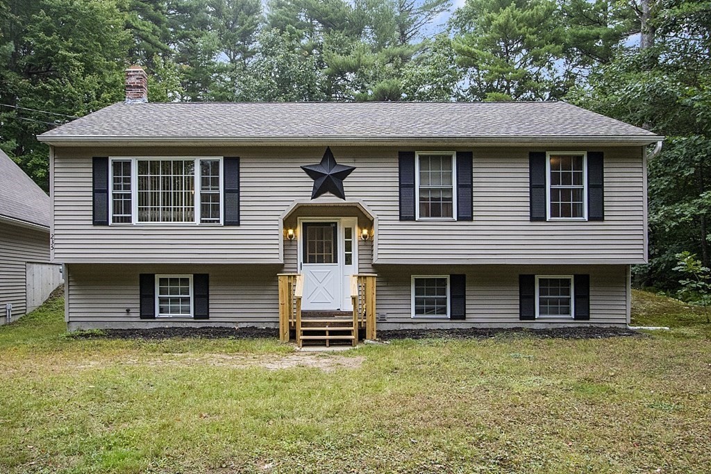 235 Minott Road Westminster, MA 01473 - Photo 5 of 32 a front view of a house with garden