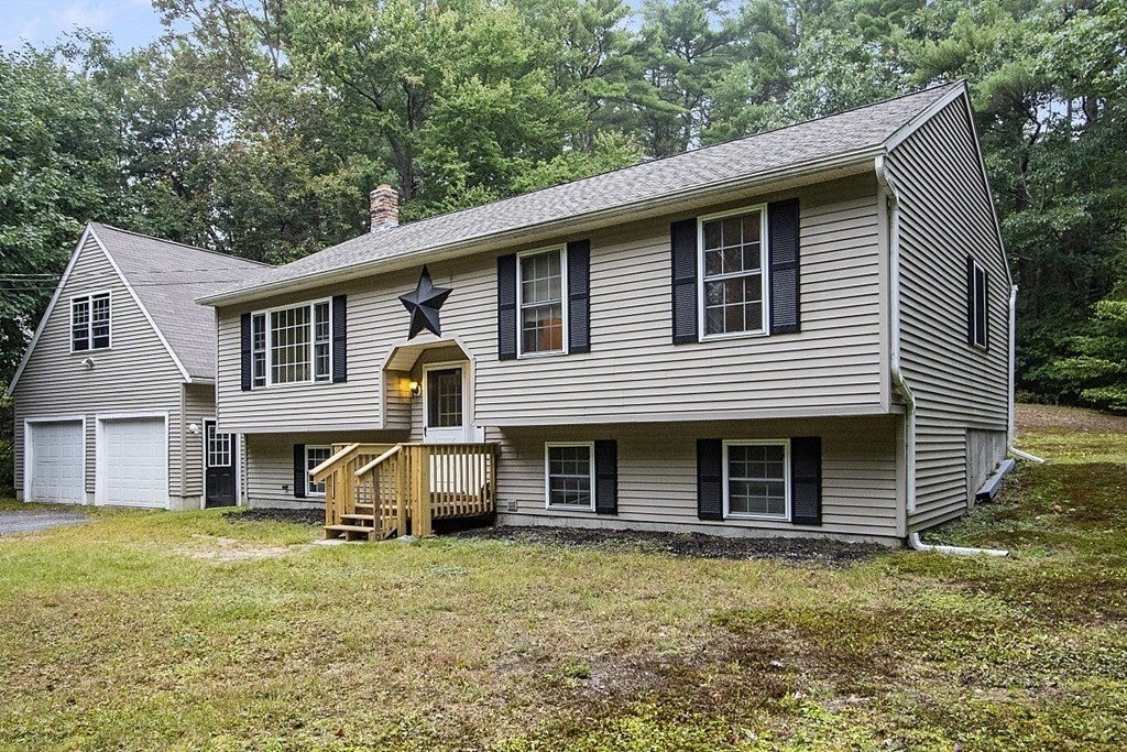 235 Minott Road Westminster, MA 01473 - Photo 6 of 32 a view of a house with a yard