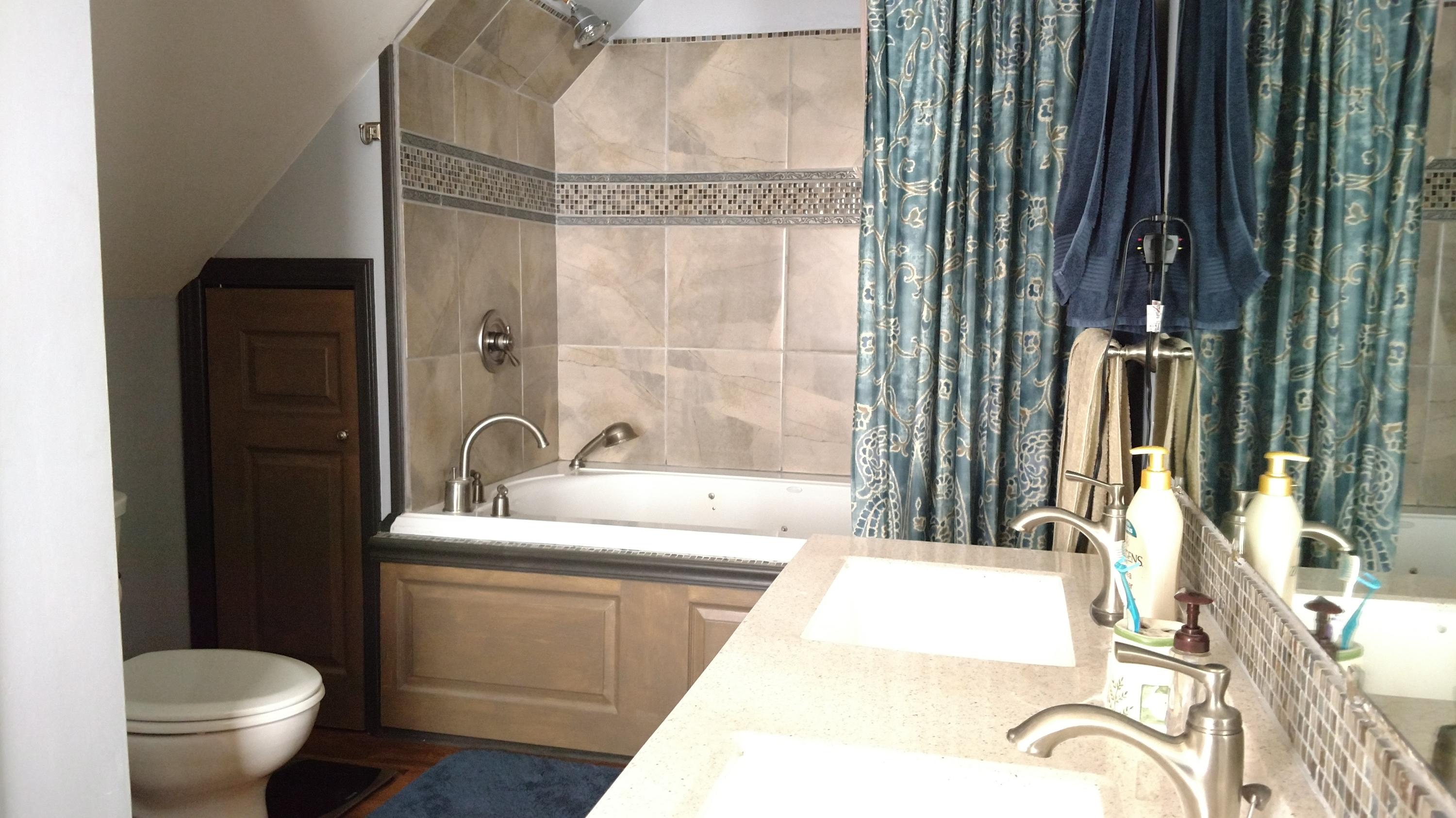 699 Highland Lake Road Union Hall, VA 24176 - Photo 14 of 33 a bathroom with a granite countertop sink and a mirror