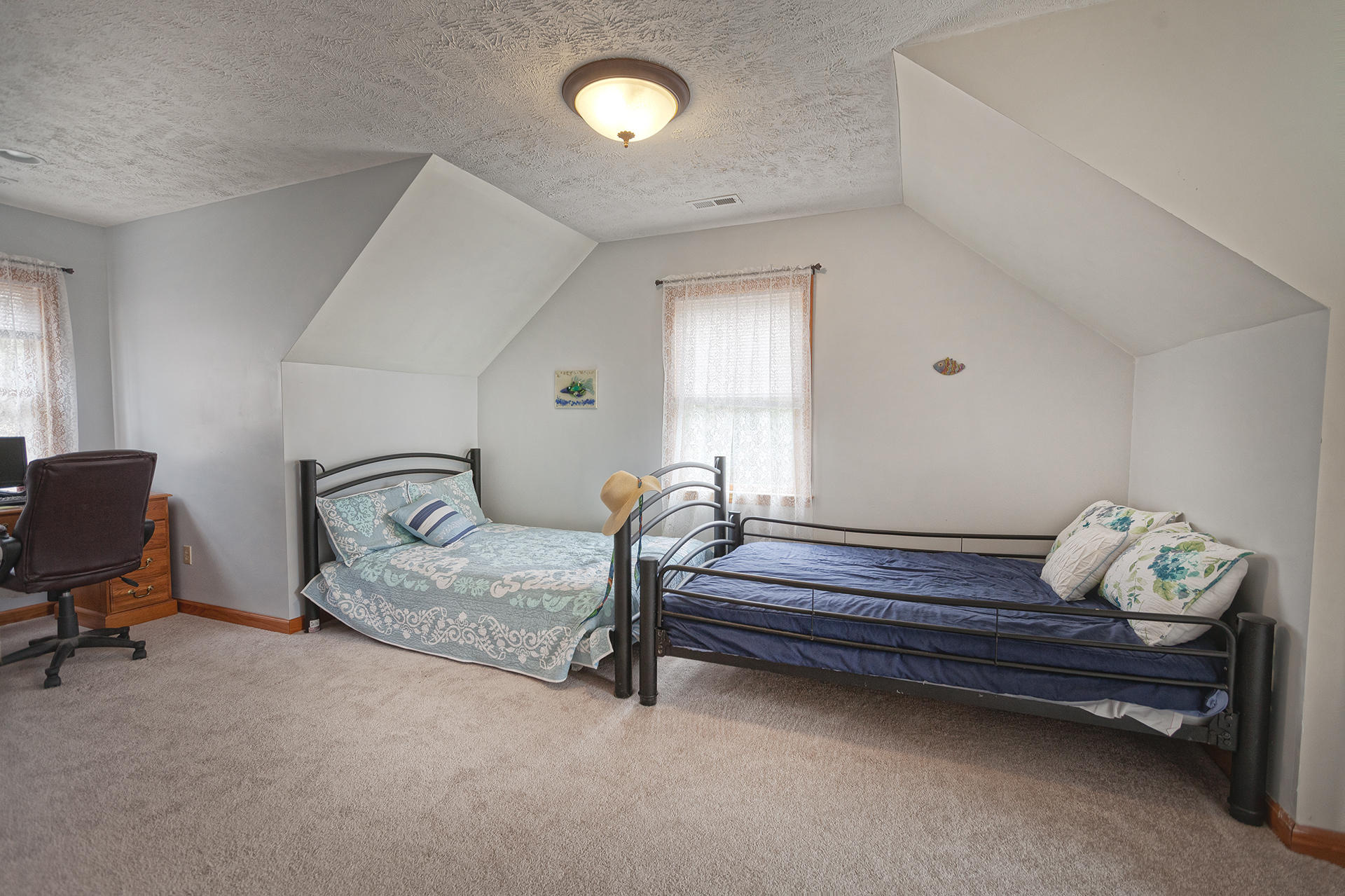 699 Highland Lake Road Union Hall, VA 24176 - Photo 17 of 33 a bedroom with bed and window