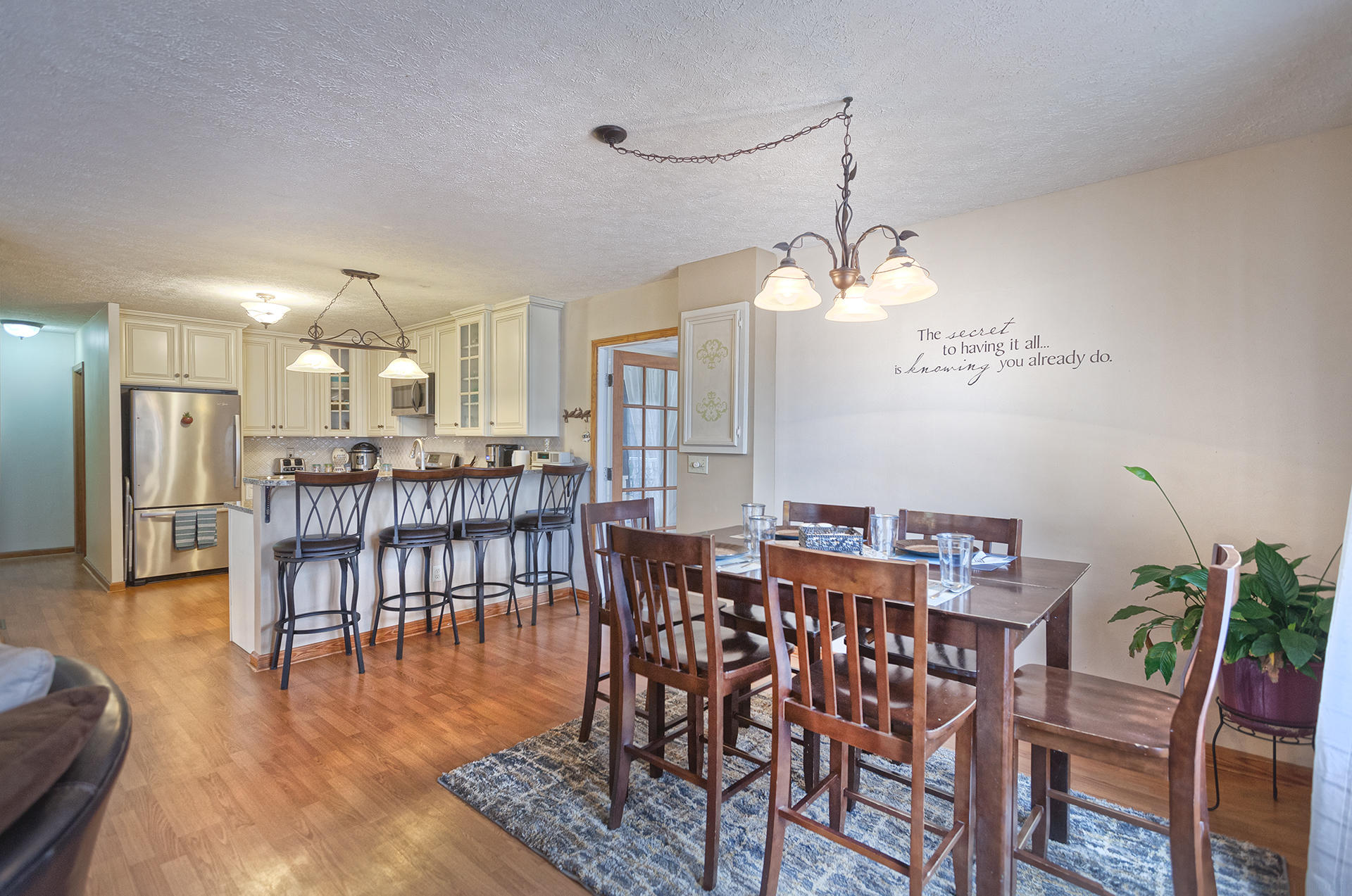 699 Highland Lake Road Union Hall, VA 24176 - Photo 5 of 33 a dining room with furniture a chandelier and wooden floor
