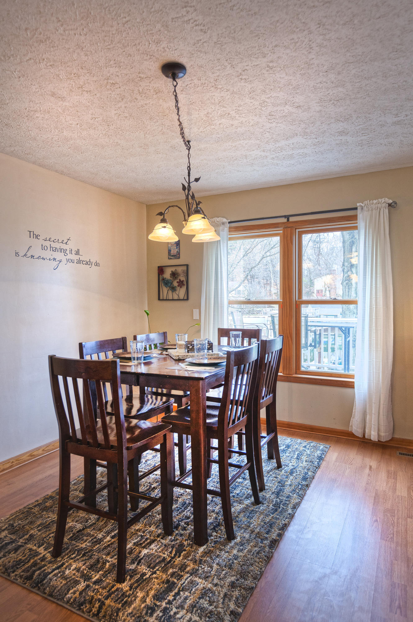 699 Highland Lake Road Union Hall, VA 24176 - Photo 6 of 33 a view of a dining room with furniture window and wooden floor