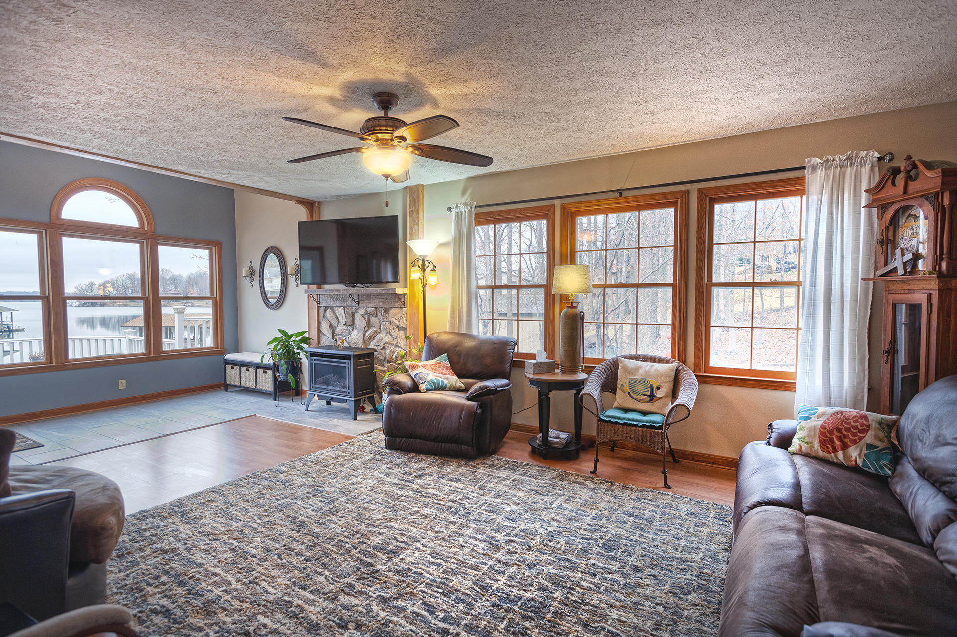 699 Highland Lake Road Union Hall, VA 24176 - Photo 9 of 33 a living room with furniture fireplace and a large window