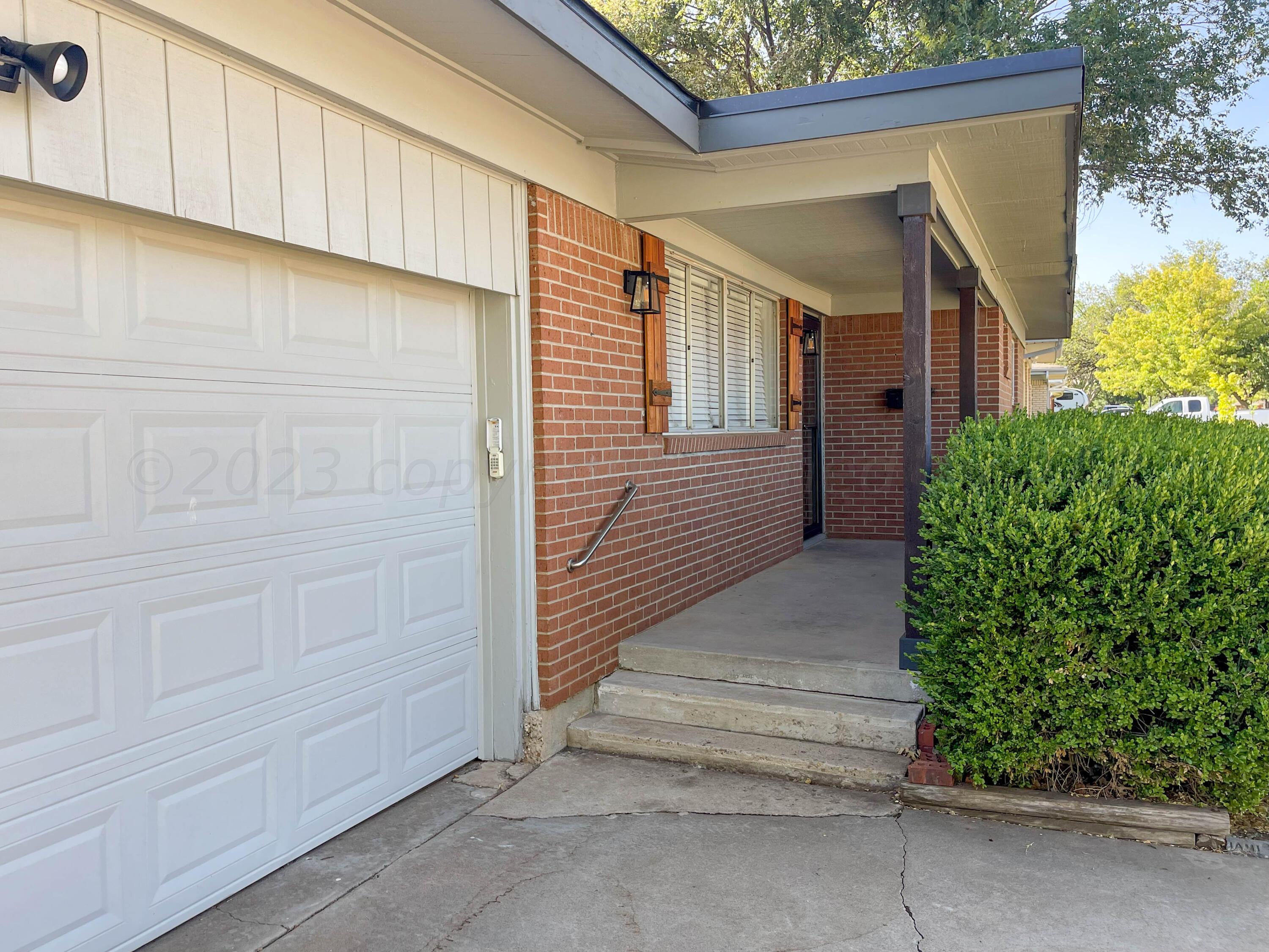 3707 Lynette Drive Amarillo, TX 79109 - Photo 3 of 45 a view of entrance gate of the house