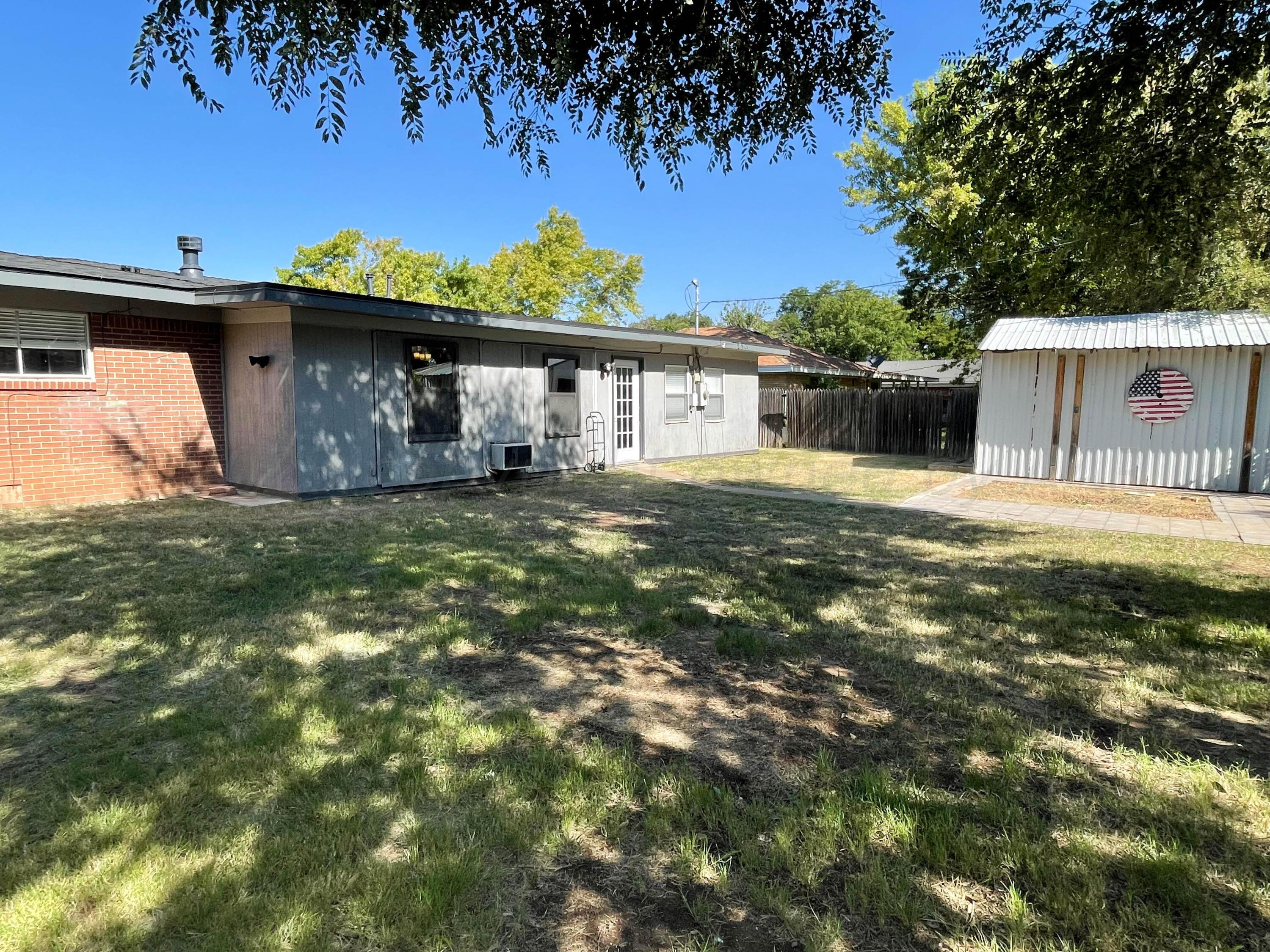 3707 Lynette Drive Amarillo, TX 79109 - Photo 39 of 45 a view of a house with a yard