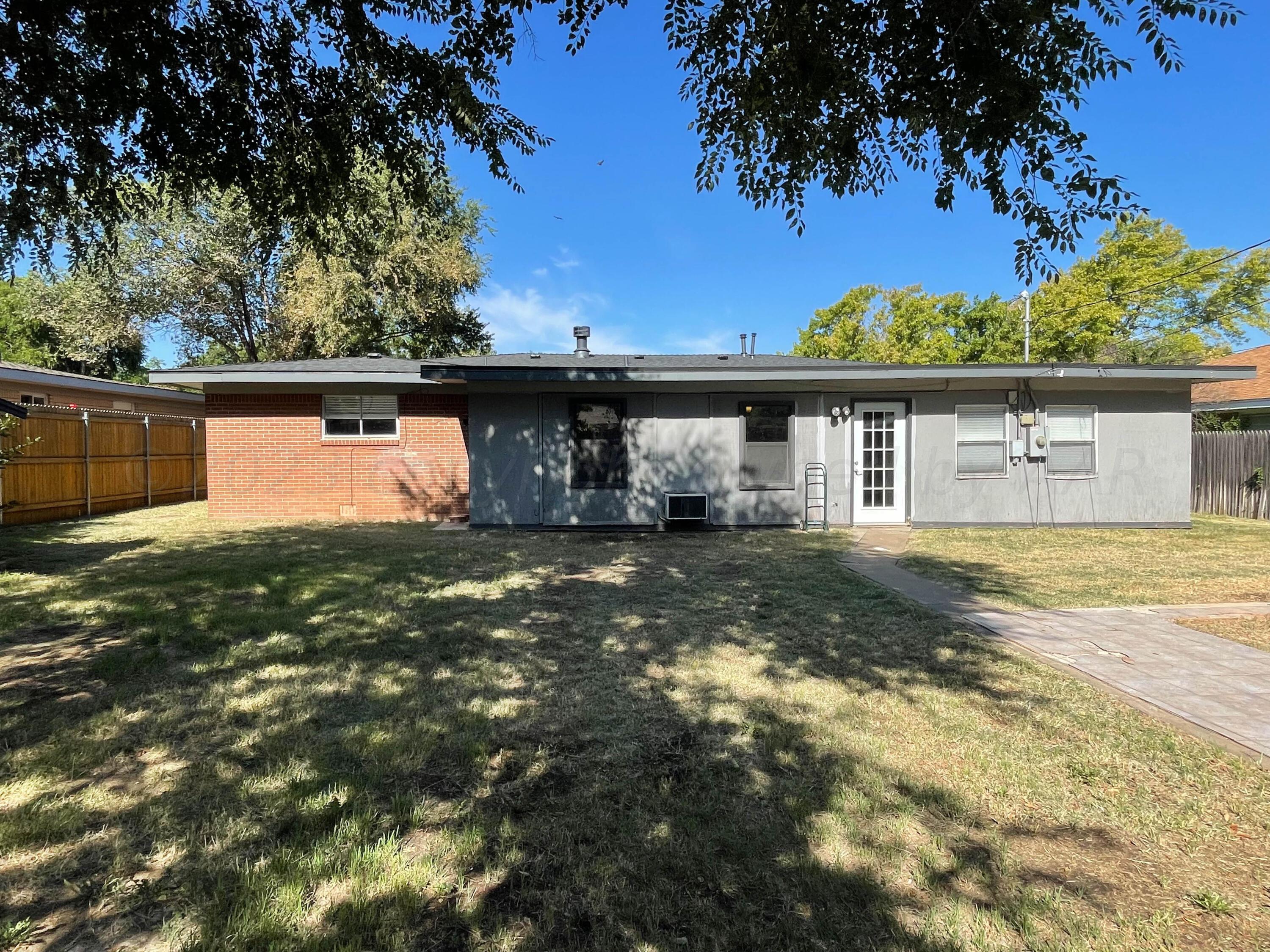3707 Lynette Drive Amarillo, TX 79109 - Photo 40 of 45 a view of a house with a backyard