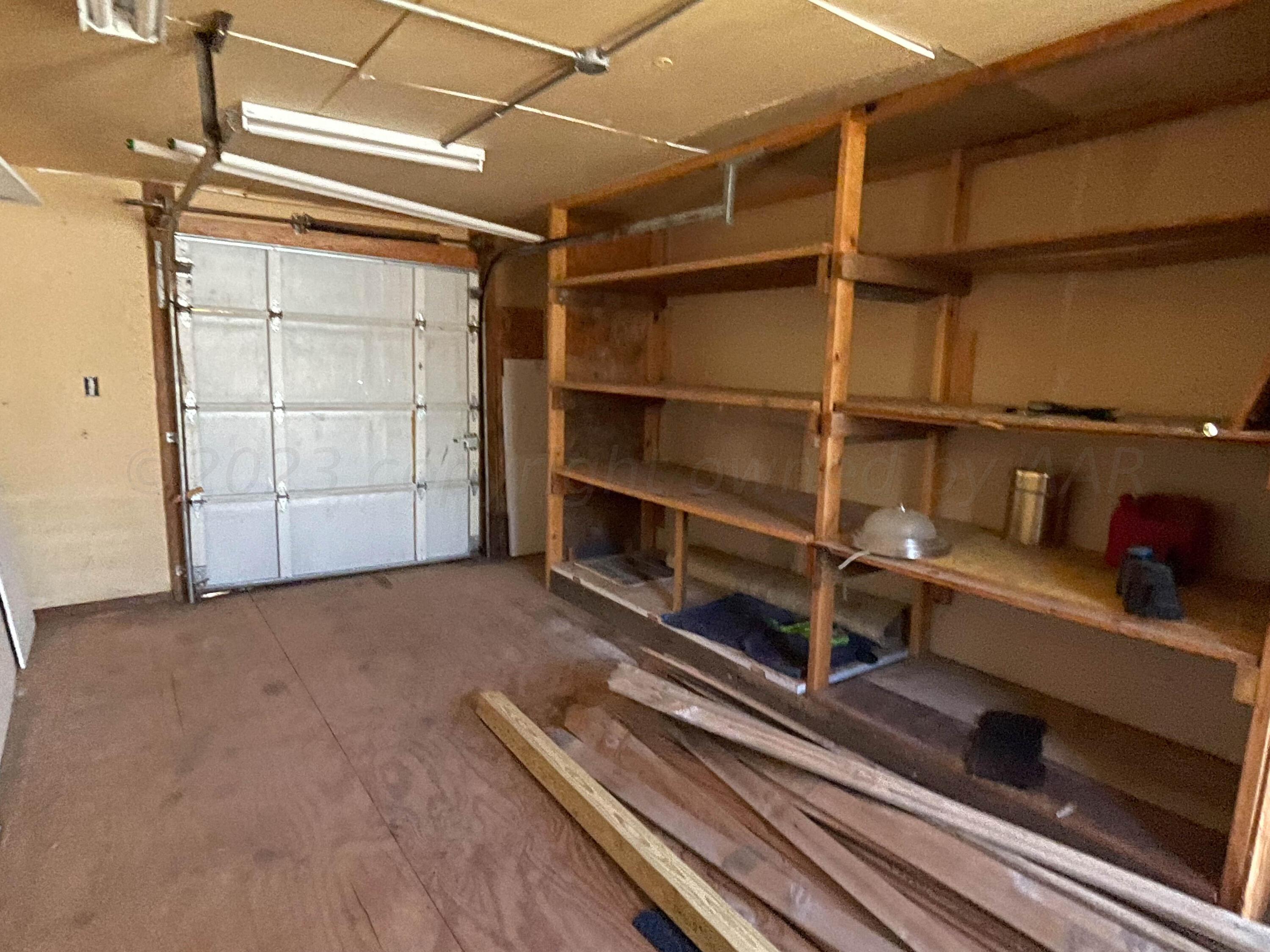 3707 Lynette Drive Amarillo, TX 79109 - Photo 42 of 45 a view of an empty room with a staircase