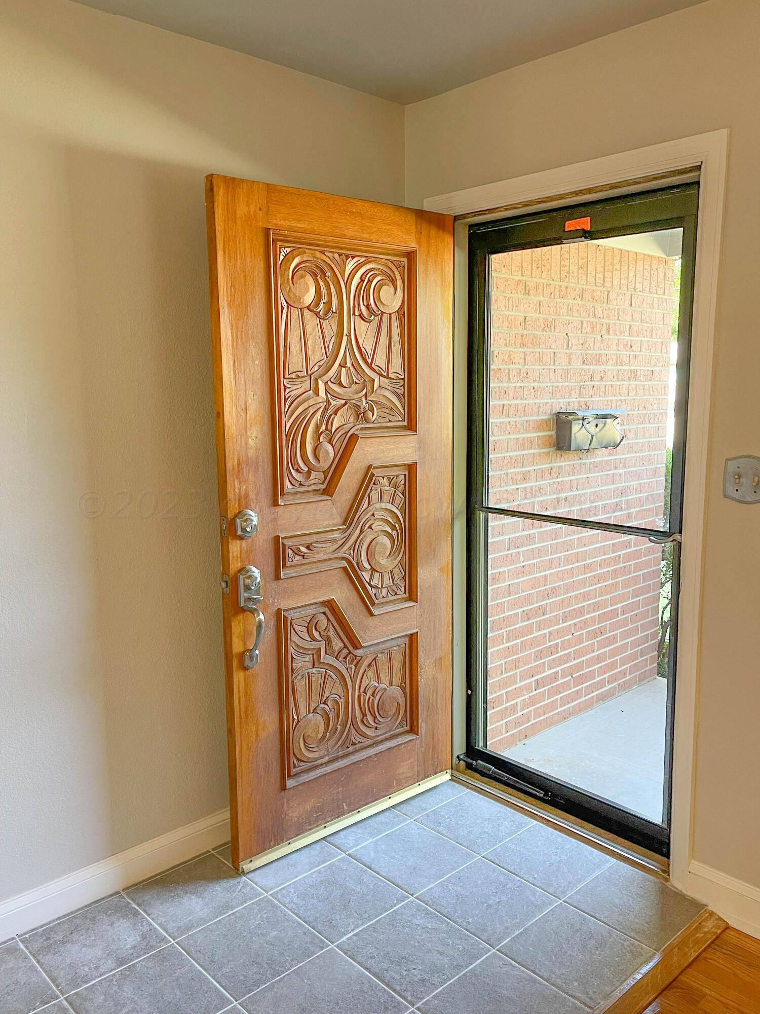 3707 Lynette Drive Amarillo, TX 79109 - Photo 6 of 45 a view of a door with a door