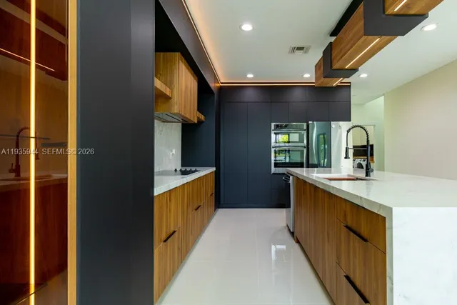 a lobby with furniture and window