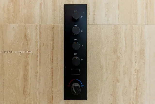 a view of a yard with plants and a bench