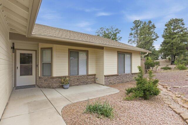 722 Boulder Ridge Road Payson, AZ 85541 - Photo 5 of 29 a front view of a house with a yard and garage