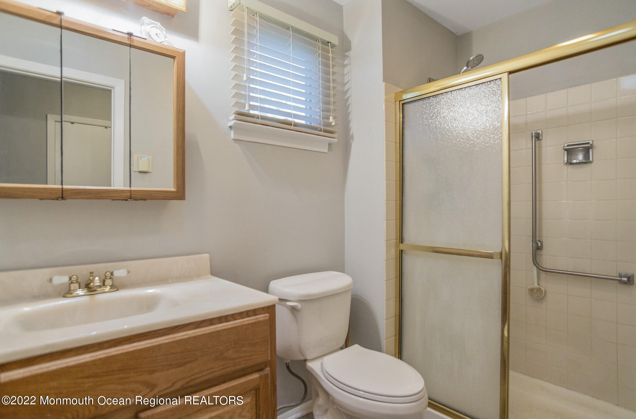 159 Sunset Road Whiting, NJ 08759 - Photo 14 of 22 a bathroom with a sink a toilet and shower
