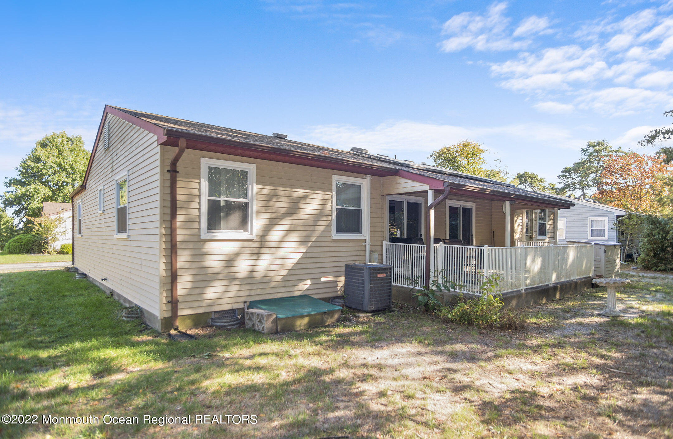 159 Sunset Road Whiting, NJ 08759 - Photo 20 of 22 a view of a house with a yard