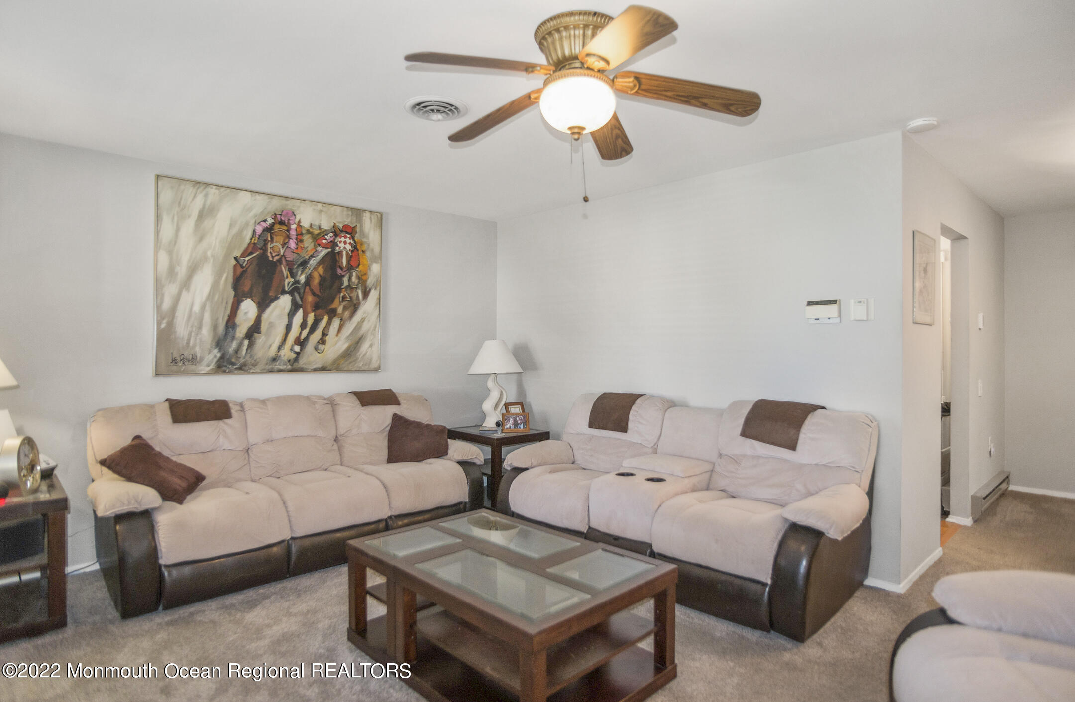 159 Sunset Road Whiting, NJ 08759 - Photo 4 of 22 a living room with furniture a couch and a ceiling fan