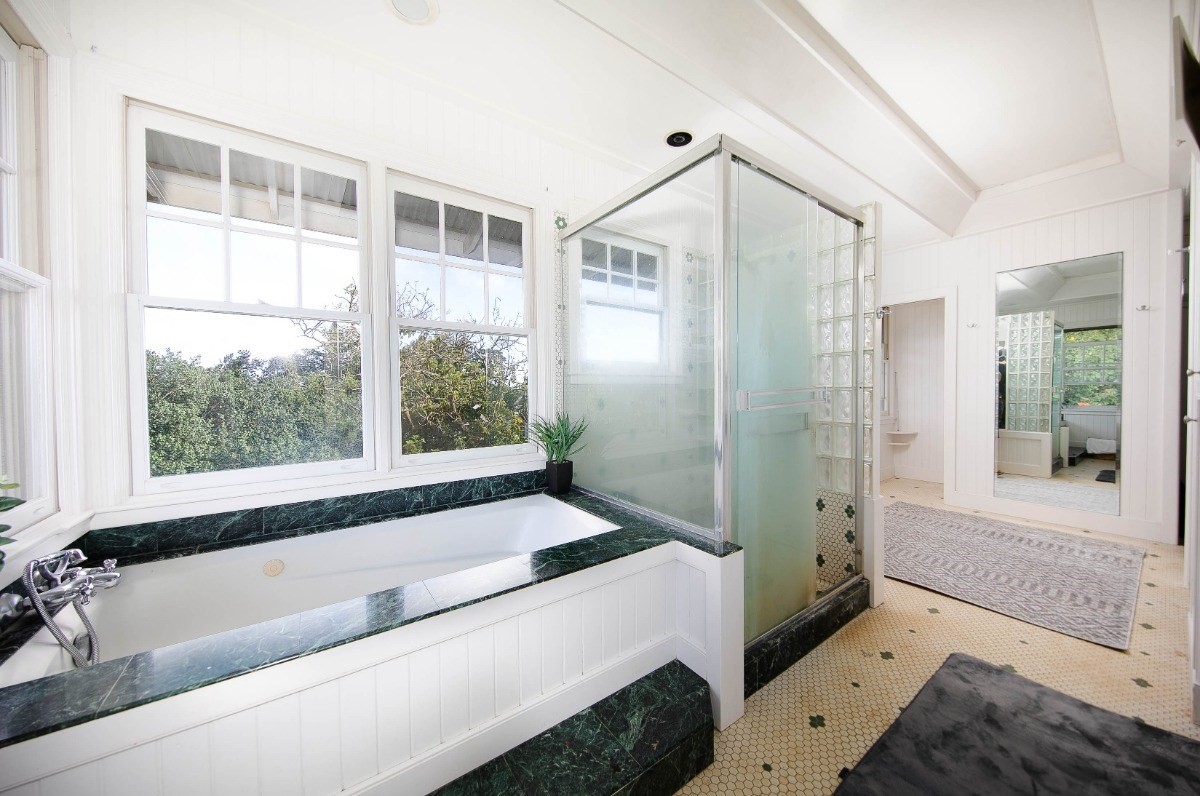 4368 Omao Road Koloa, HI 96756 - Photo 17 of 30 a bathroom with a tub and a sink