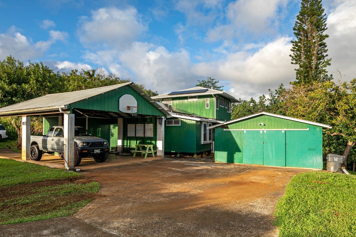 4368 Omao Road Koloa, HI 96756 - Photo 20 of 30 a view of a house with a yard and porch