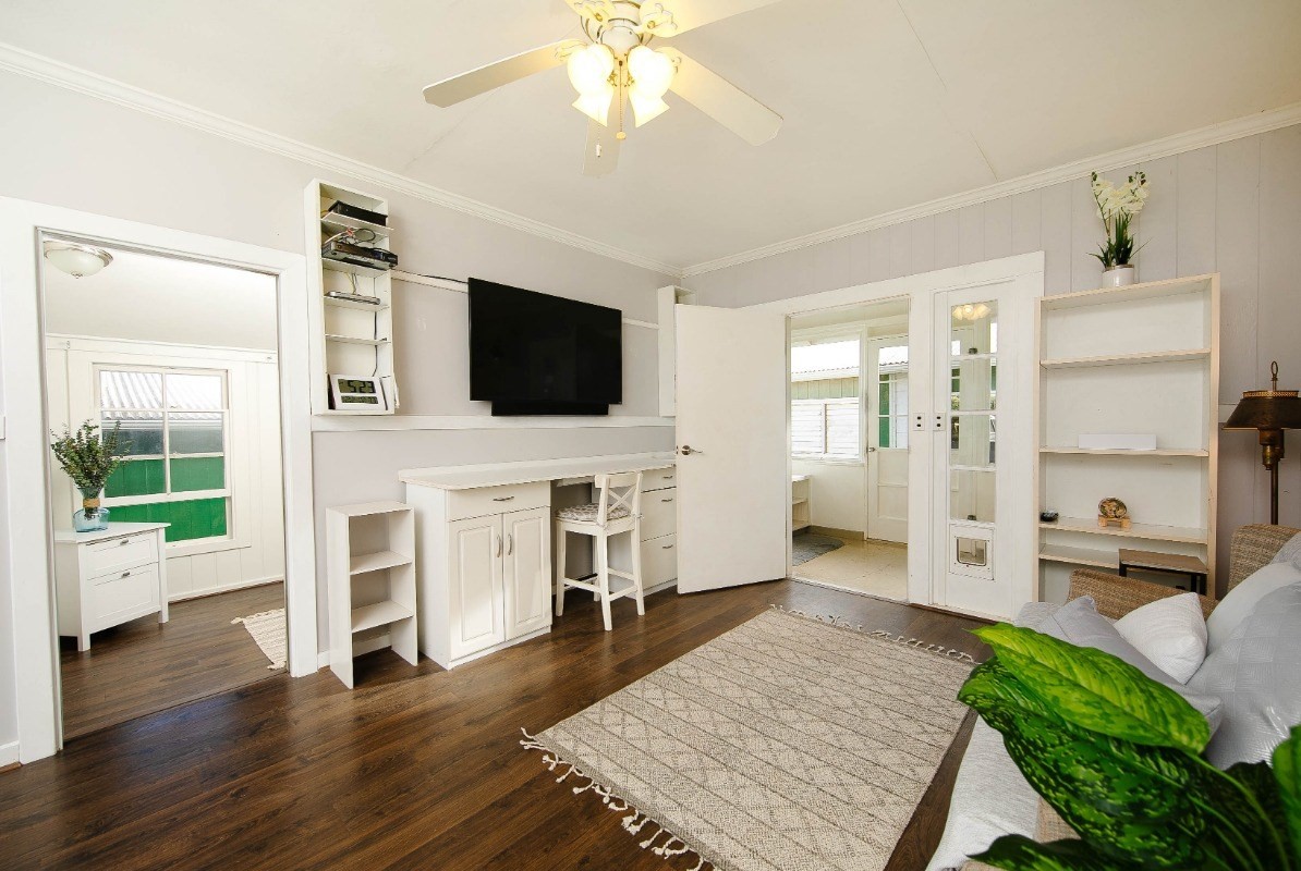 4368 Omao Road Koloa, HI 96756 - Photo 5 of 30 a living room with furniture and a flat screen tv