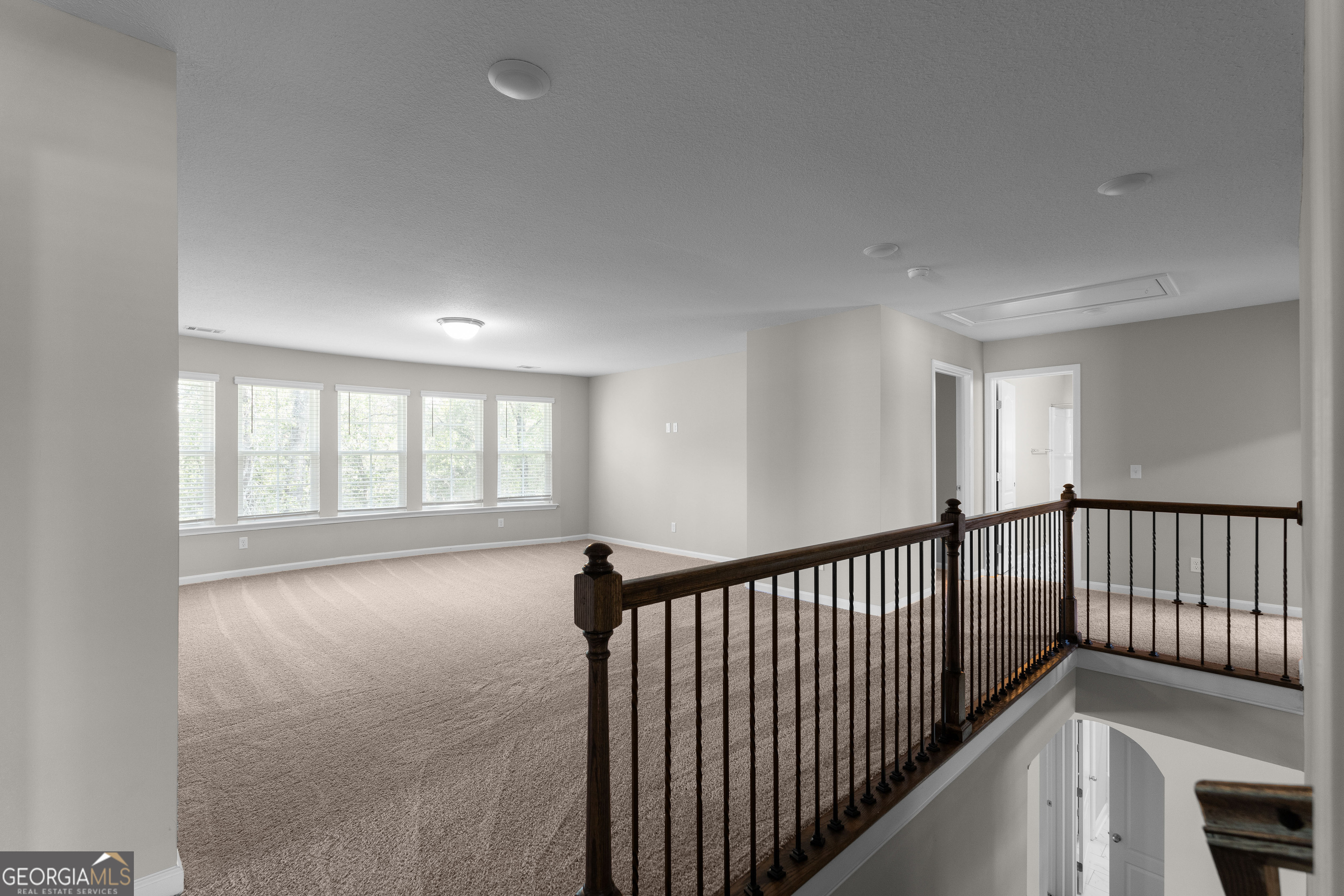 140 Watson Mill Road Guyton, GA 31312 - Photo 16 of 32 a view of hallway with stairs