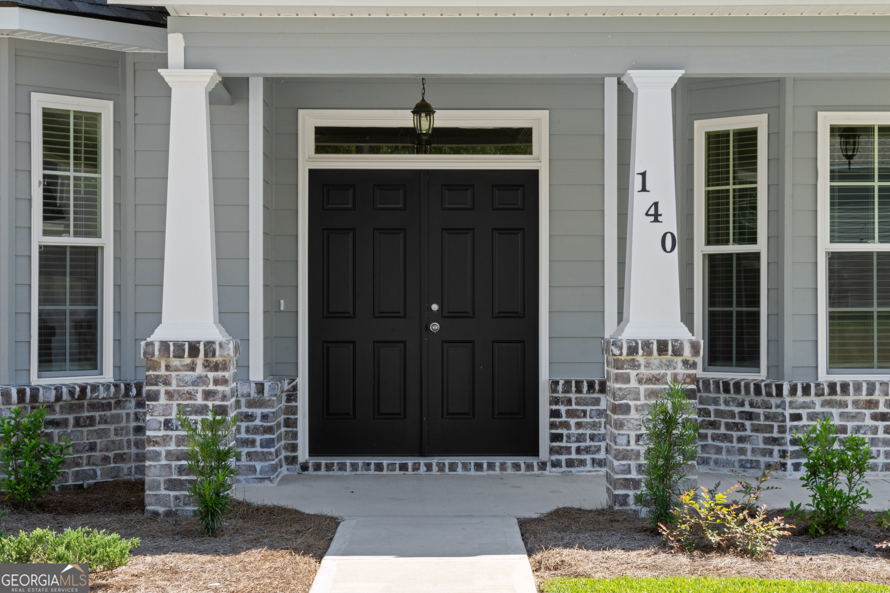 140 Watson Mill Road Guyton, GA 31312 - Photo 4 of 32 front view of a house with a window
