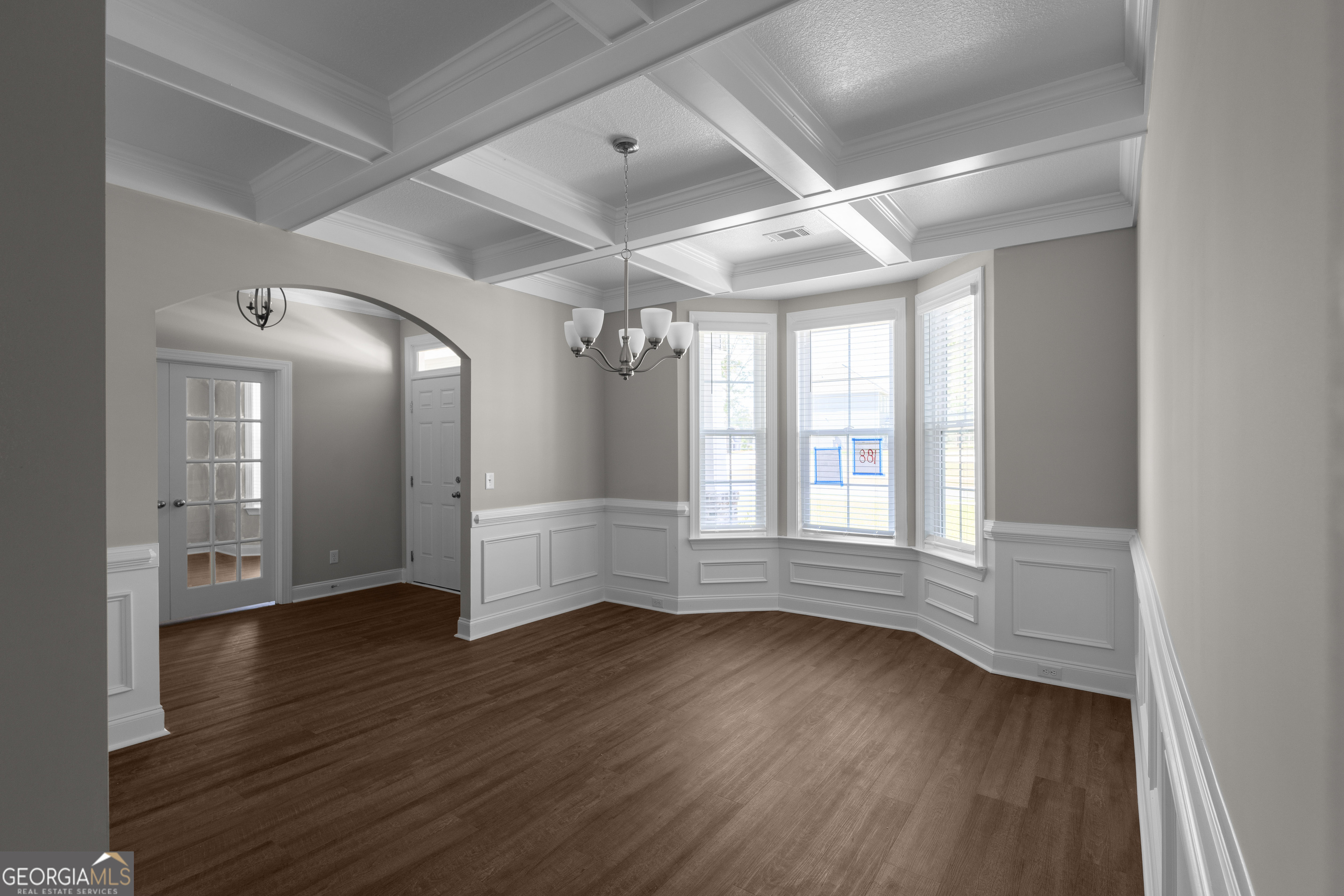 140 Watson Mill Road Guyton, GA 31312 - Photo 7 of 32 a view of empty room with wooden floor and fan