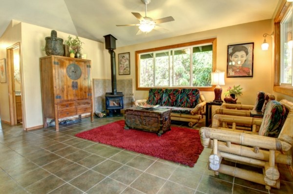 11-3125 Kaleponi Road Mountain View, HI 96771 - Photo 13 of 25 a living room with furniture and a large window