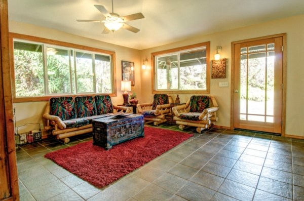 11-3125 Kaleponi Road Mountain View, HI 96771 - Photo 15 of 25 a living room with furniture and a large window