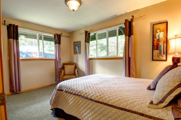 11-3125 Kaleponi Road Mountain View, HI 96771 - Photo 18 of 25 a bedroom with a bed and window