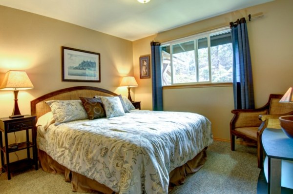 11-3125 Kaleponi Road Mountain View, HI 96771 - Photo 19 of 25 a bed sitting in a bedroom next to a window