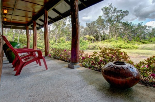 11-3125 Kaleponi Road Mountain View, HI 96771 - Photo 4 of 25 a view of a chairs and table in the patio