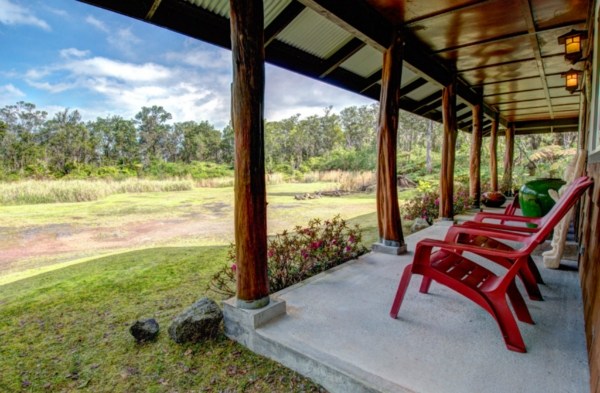 11-3125 Kaleponi Road Mountain View, HI 96771 - Photo 6 of 25 a bench sitting in middle of yard and ocean view