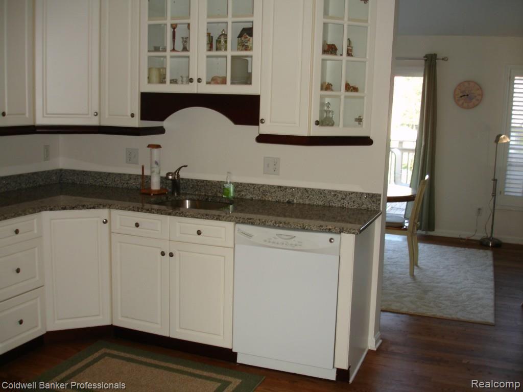 3344 Woodcrest Road Rochester, MI 48309 - Photo 8 of 23 White kitchen cabinets, granite counter tops...