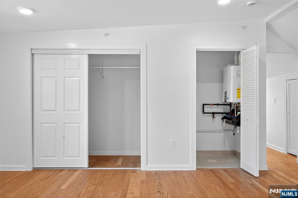 167 Harrison Avenue, Unit 3 Montclair, NJ 07042 - Photo 13 of 20 wooden floor in an empty room