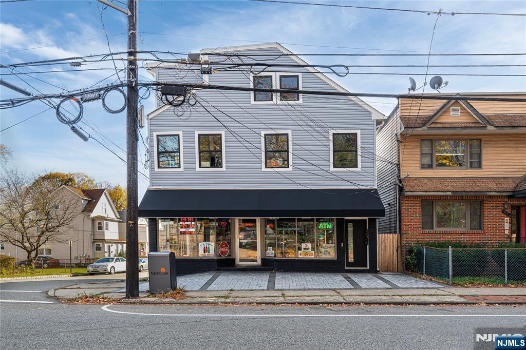 167 Harrison Avenue, Unit 3 Montclair, NJ 07042 - Photo 19 of 20 a front view of a house with a garden