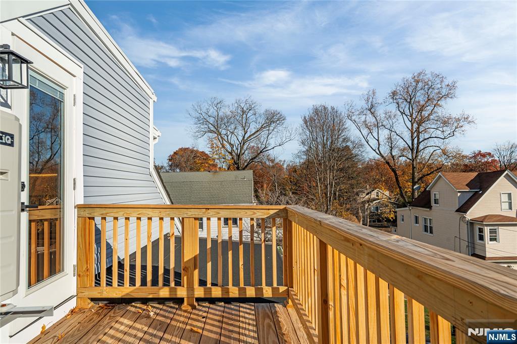 167 Harrison Avenue, Unit 3 Montclair, NJ 07042 - Photo 7 of 20 a view of a roof deck with wooden fence and floor