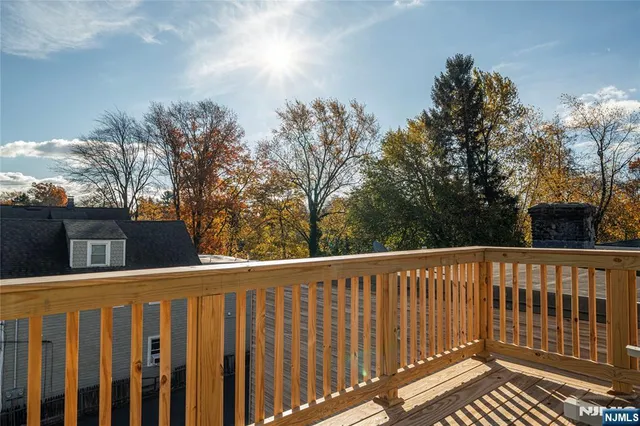a view of a wooden fence