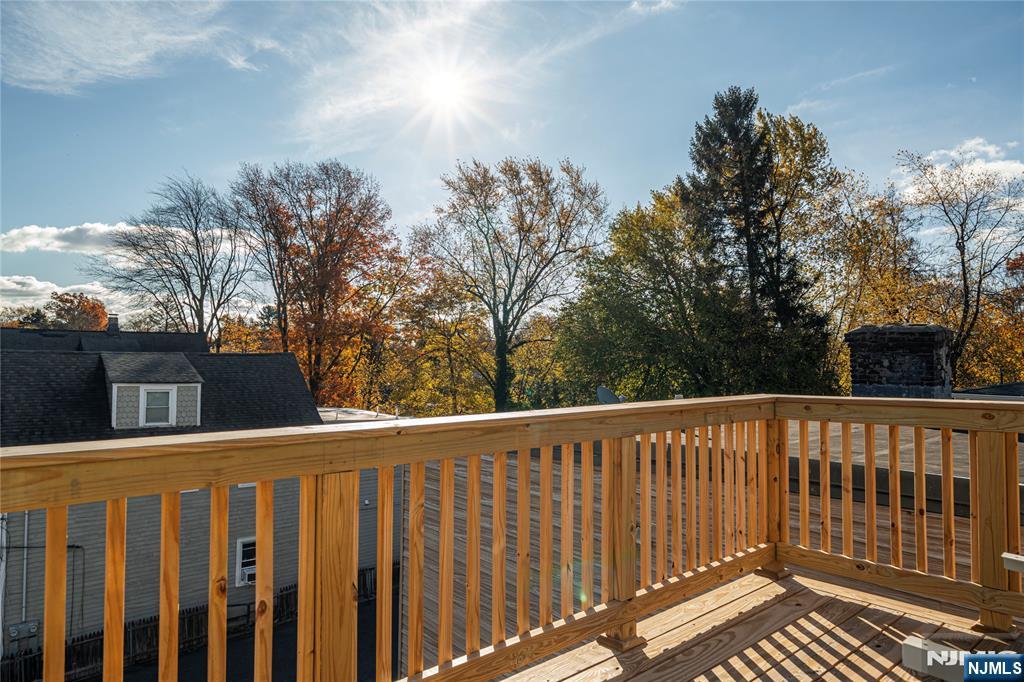 167 Harrison Avenue, Unit 3 Montclair, NJ 07042 - Photo 8 of 20 a view of a wooden fence