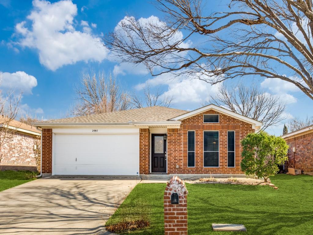 2097 Quarter Horse Lane Keller, TX 76248 - Photo 1 of 16 a front view of a house with a yard