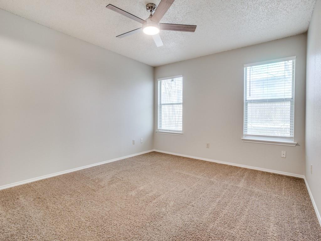 2097 Quarter Horse Lane Keller, TX 76248 - Photo 11 of 16 an empty room with a window and ceiling fan