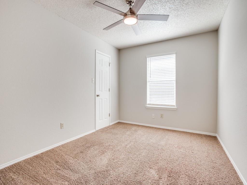 2097 Quarter Horse Lane Keller, TX 76248 - Photo 13 of 16 an empty room with a window and a fan