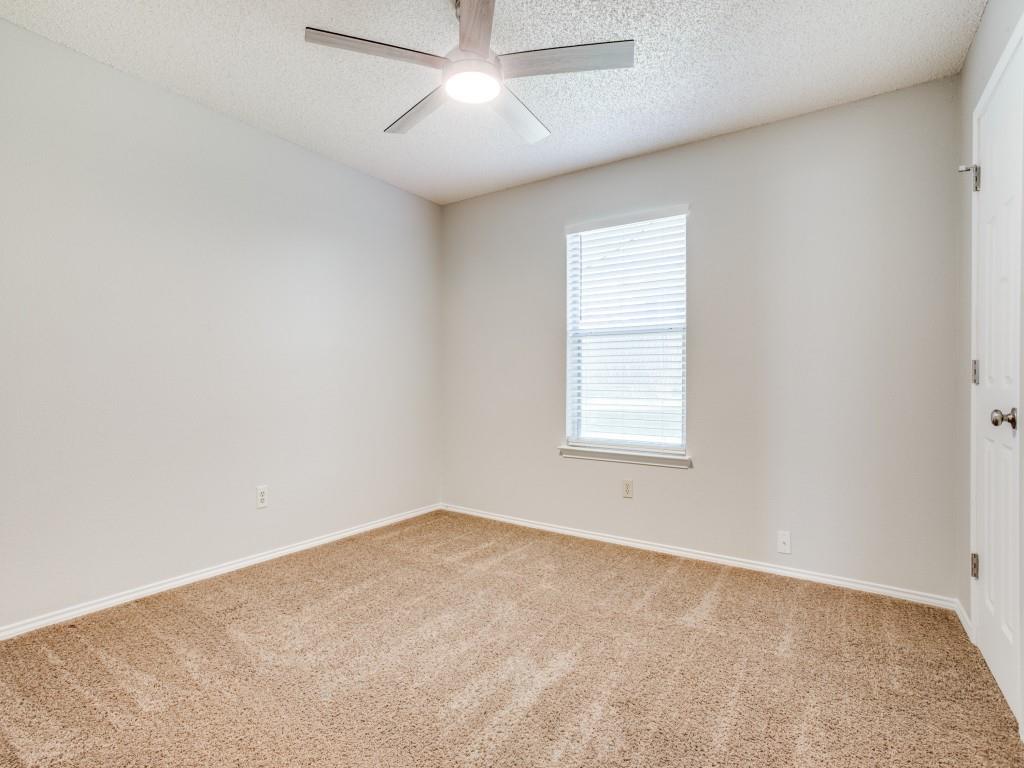 2097 Quarter Horse Lane Keller, TX 76248 - Photo 14 of 16 an empty room with a window and ceiling fan